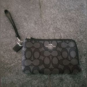 Coach corner zip wristlet.